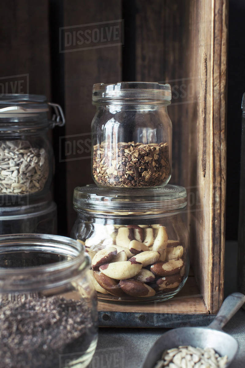 Closeup of food in glass jars on kitchen counter Stock Photo Dissolve