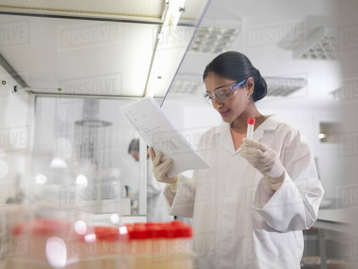 Laboratory technician at work Stock Photo Dissolve