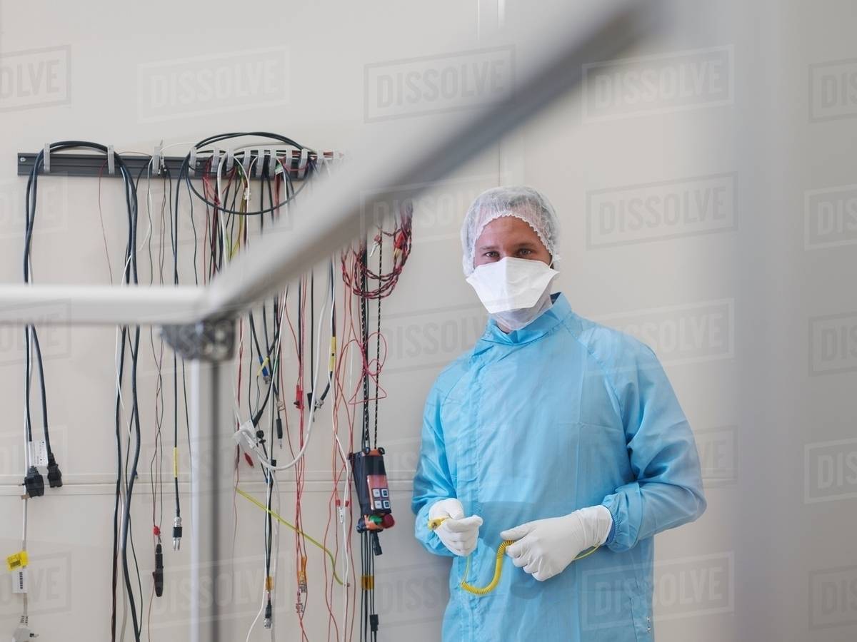 Worker in satellite testing station Stock Photo Dissolve