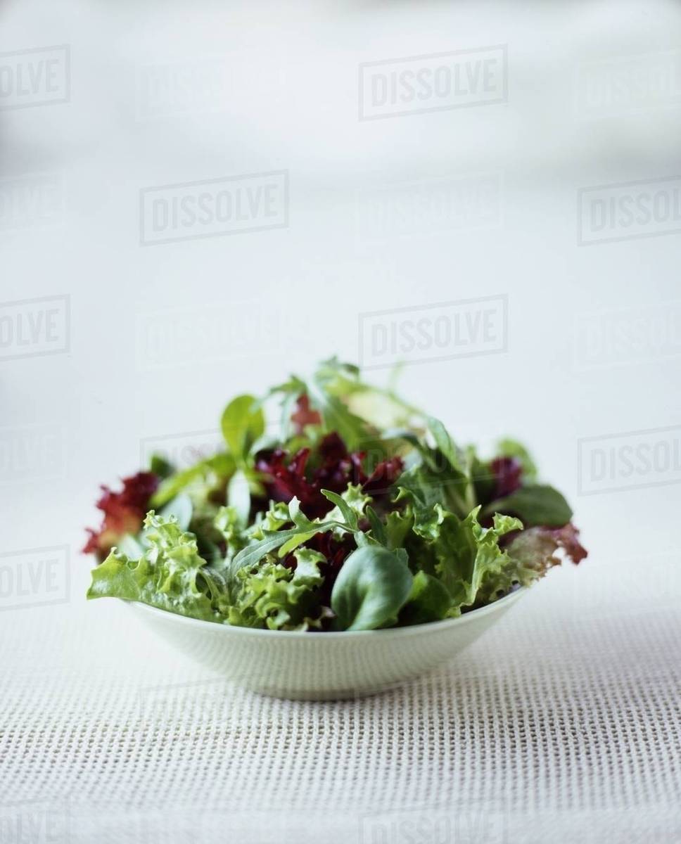 Mixed leaf salad in bowl Stock Photo Dissolve