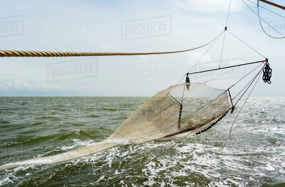 Seine fishing nets of fishing boat on ocean, Waddenzee, Friesland