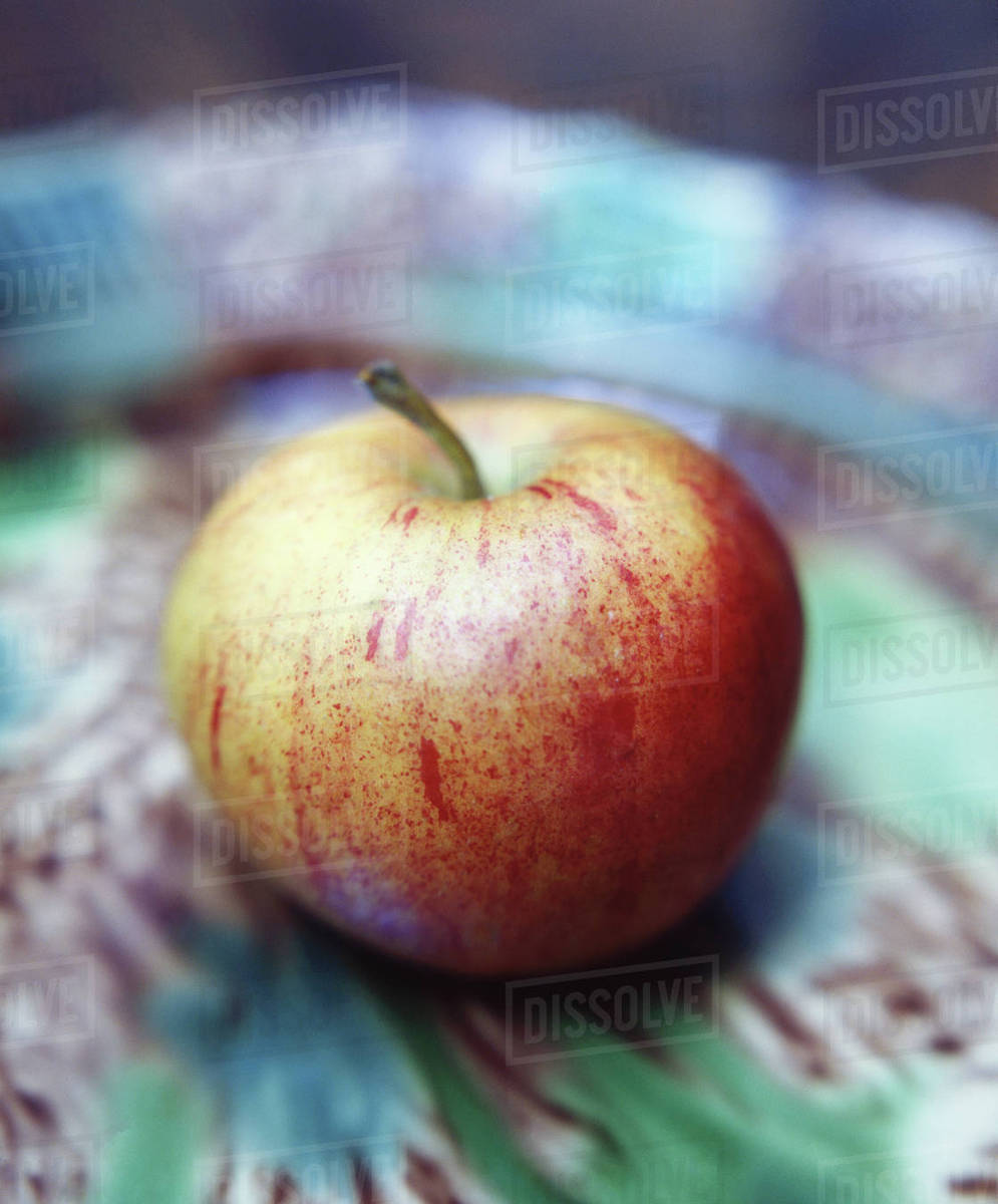 Food, fruit, apple in colourful bowl - Stock Photo - Dissolve