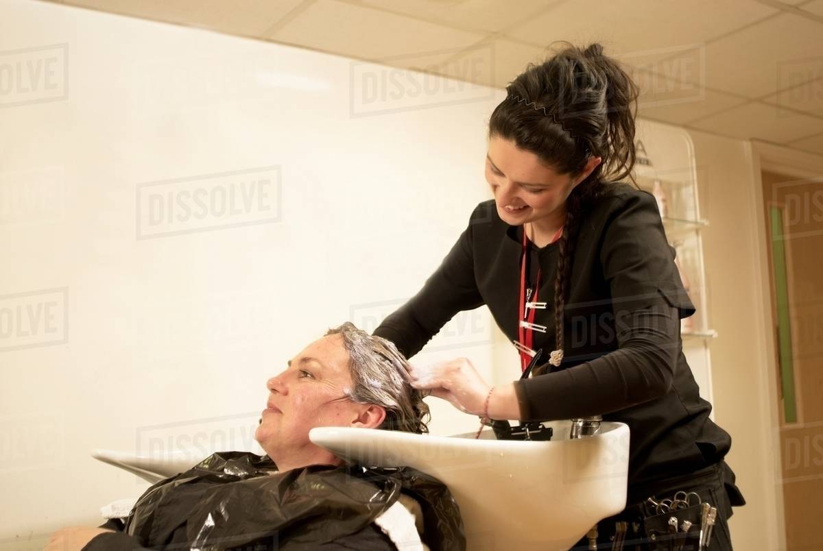Hair Stylist Washing Clients Hair Stock Photo Dissolve