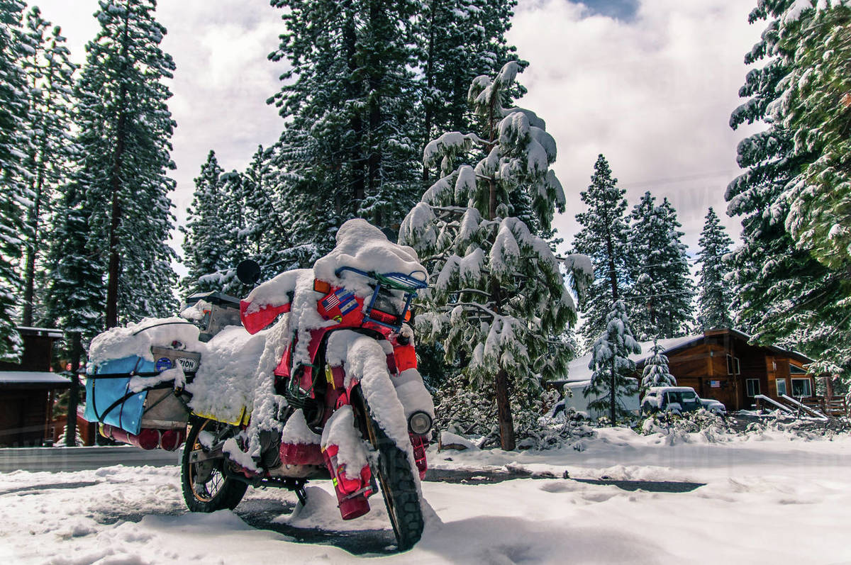 Touring bike covered in snow, Truckee, California, USA Stock Photo