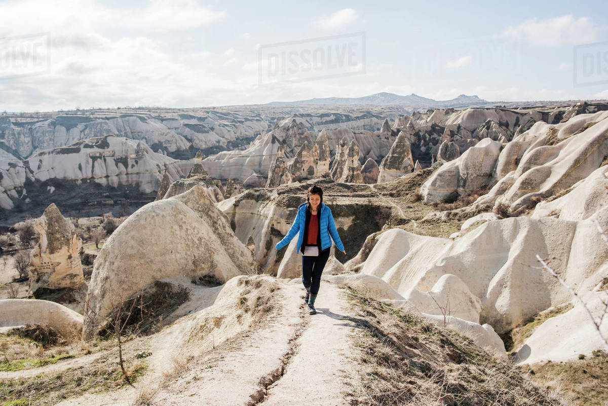 Woman hiking in rocky valley, Göreme, Cappadocia, Nevsehir, Turkey Royalty-free stock photo