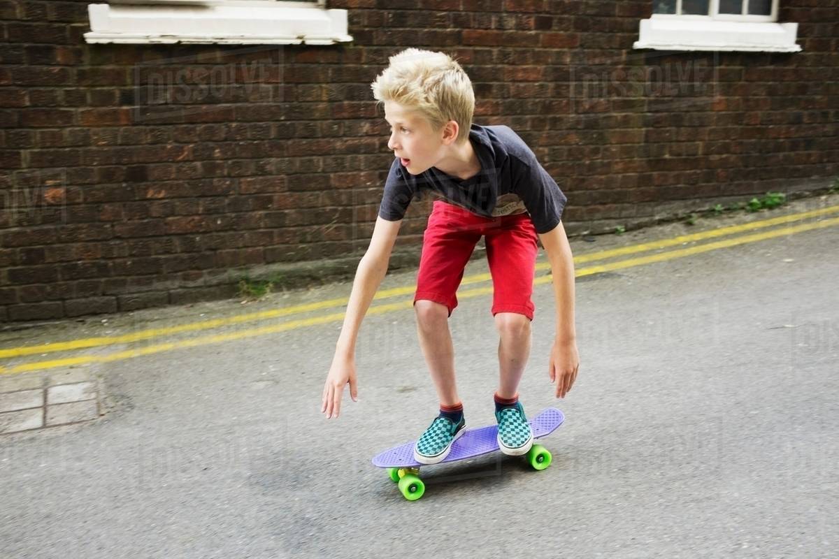 Boy skateboarding Stock Photo Dissolve