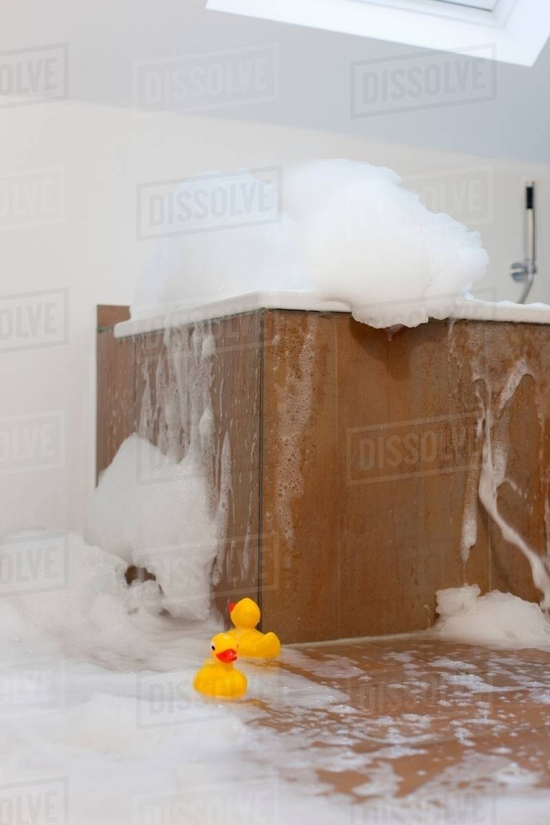 Bath tub overflowing Stock Photo Dissolve