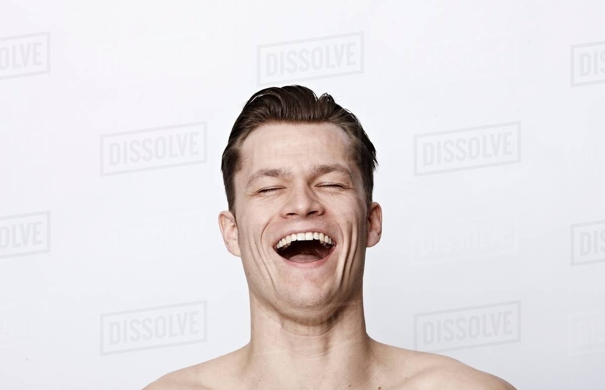Nude man laughing - Royalty-free Stock Photo Dissolve