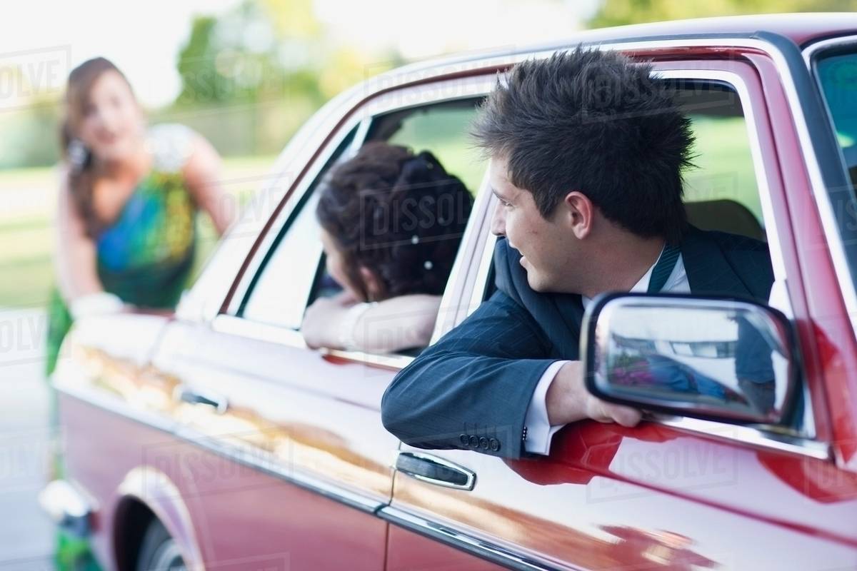 teenage girl in gown pushing car stock photo dissolve