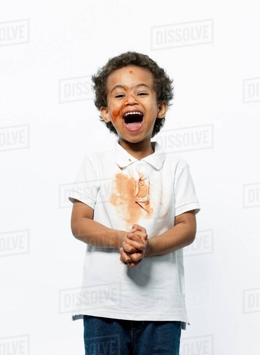 Boy playing with jam Stock Photo Dissolve