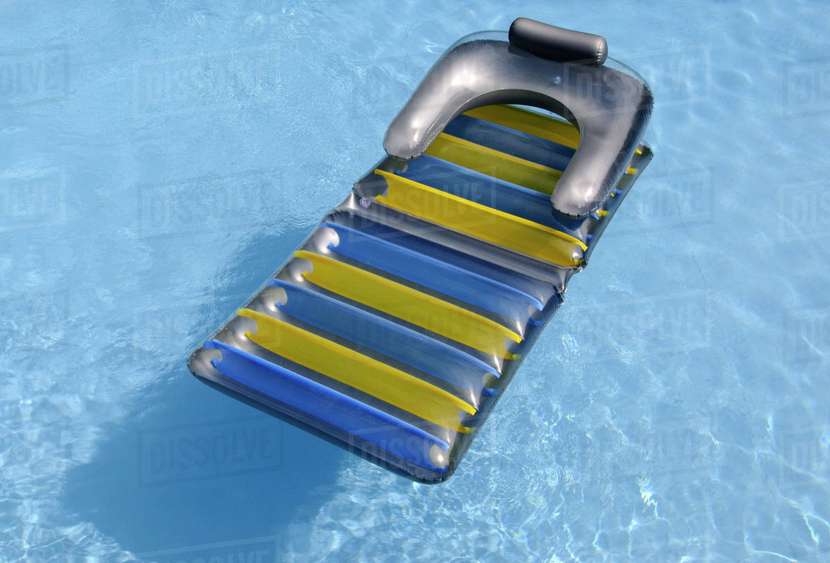 Float in swimming pool Stock Photo Dissolve