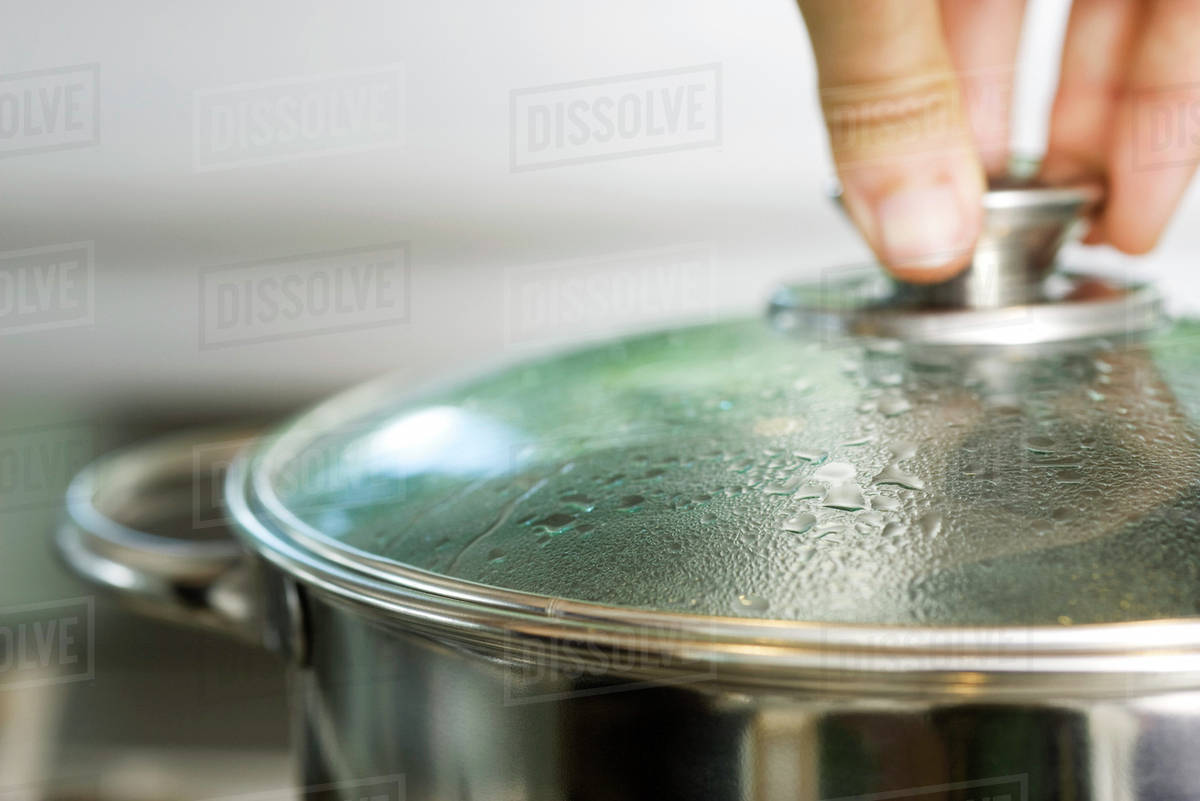 Condensation on lid of cooking pot Stock Photo Dissolve