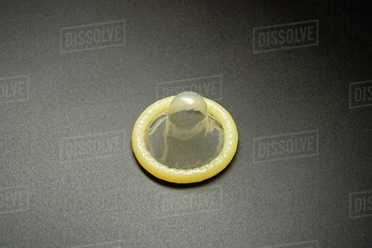 Condom, closeup Stock Photo Dissolve