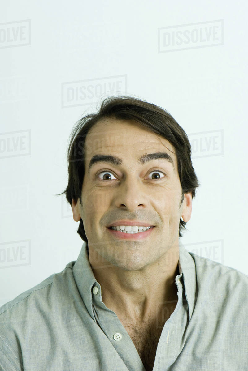 Man Smiling Eyes Wide Open Portrait Stock Photo - 