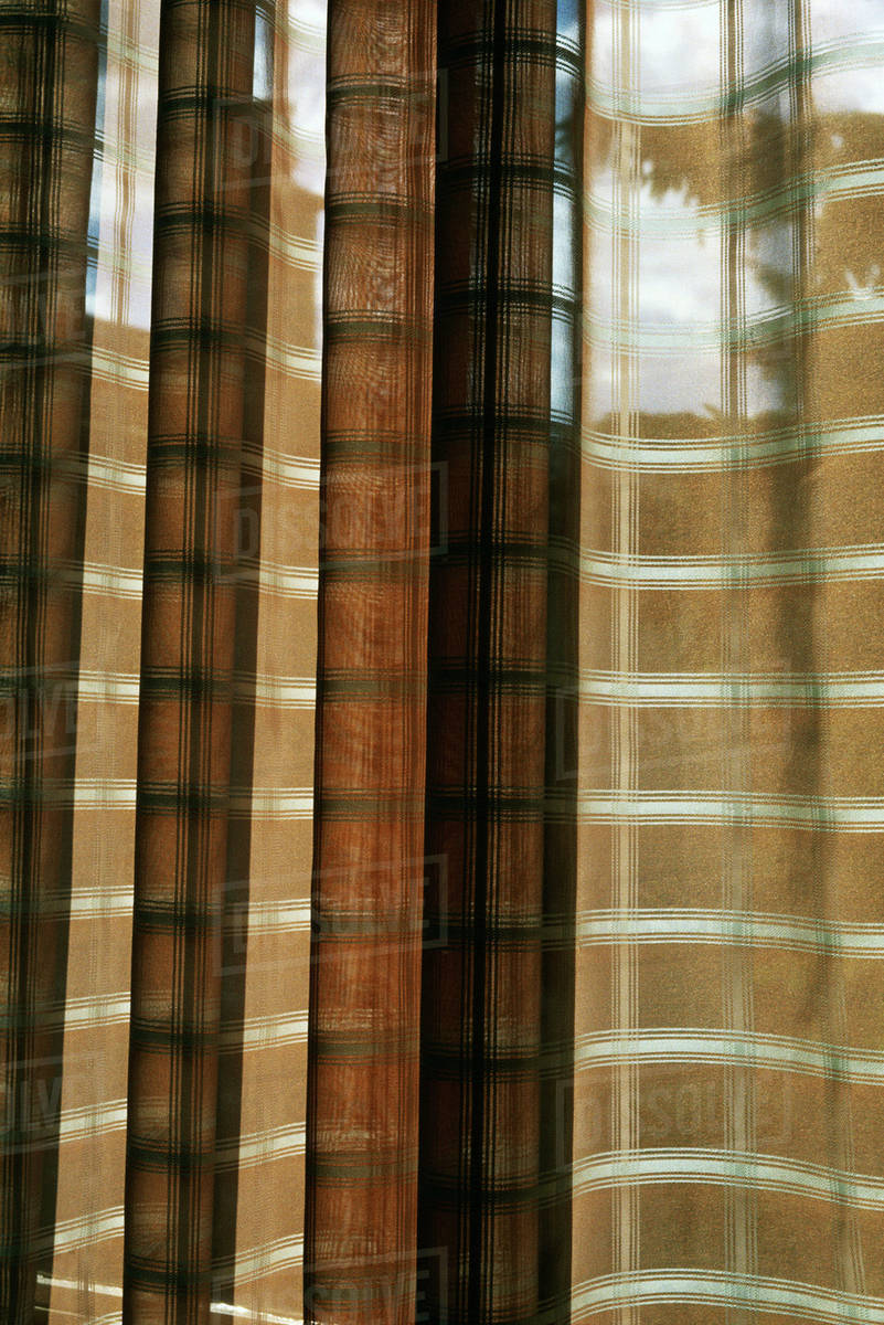 Plaid Curtains In Window Full Frame Stock Photo Dissolve