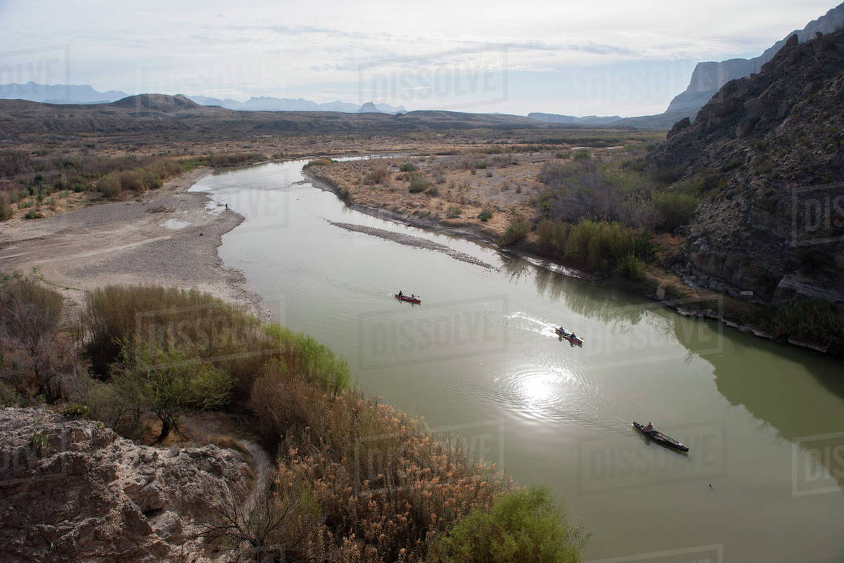 Tourists canoeing on the Rio Grande in Big Bend National Park, Texas, USA Stock Photo Dissolve