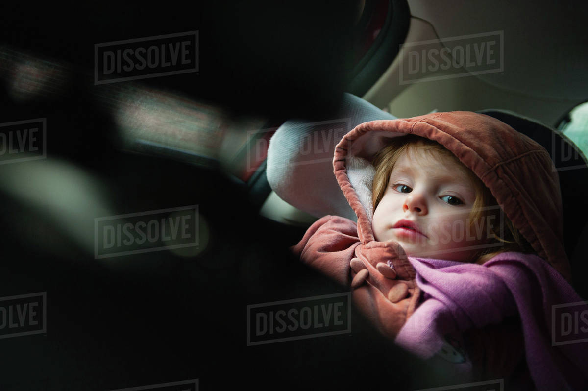 Little Girl In Car Seat Portrait Stock Photo