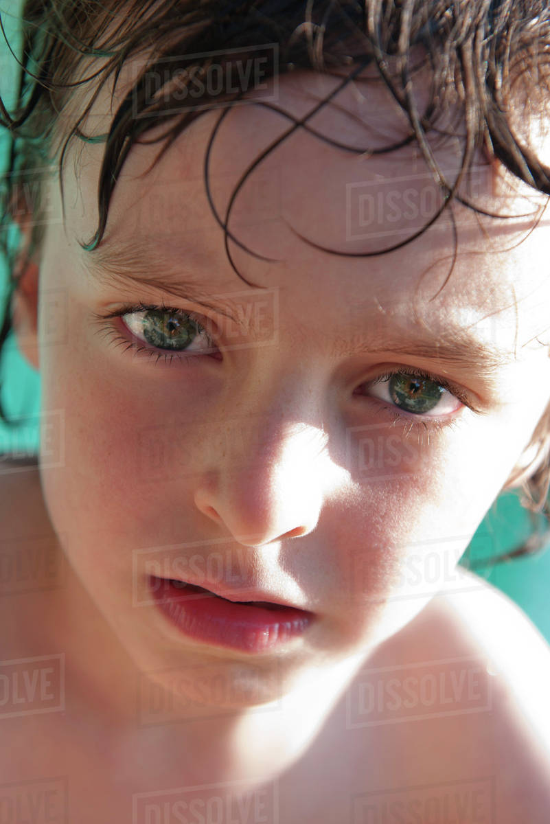 Boy with wet hair, portrait Stock Photo Dissolve