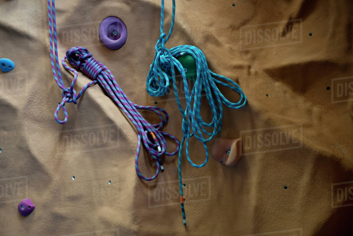 Ropes on climbing wall Stock Photo Dissolve