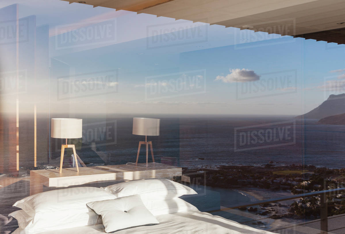 Modern bedroom overlooking ocean Stock Photo Dissolve