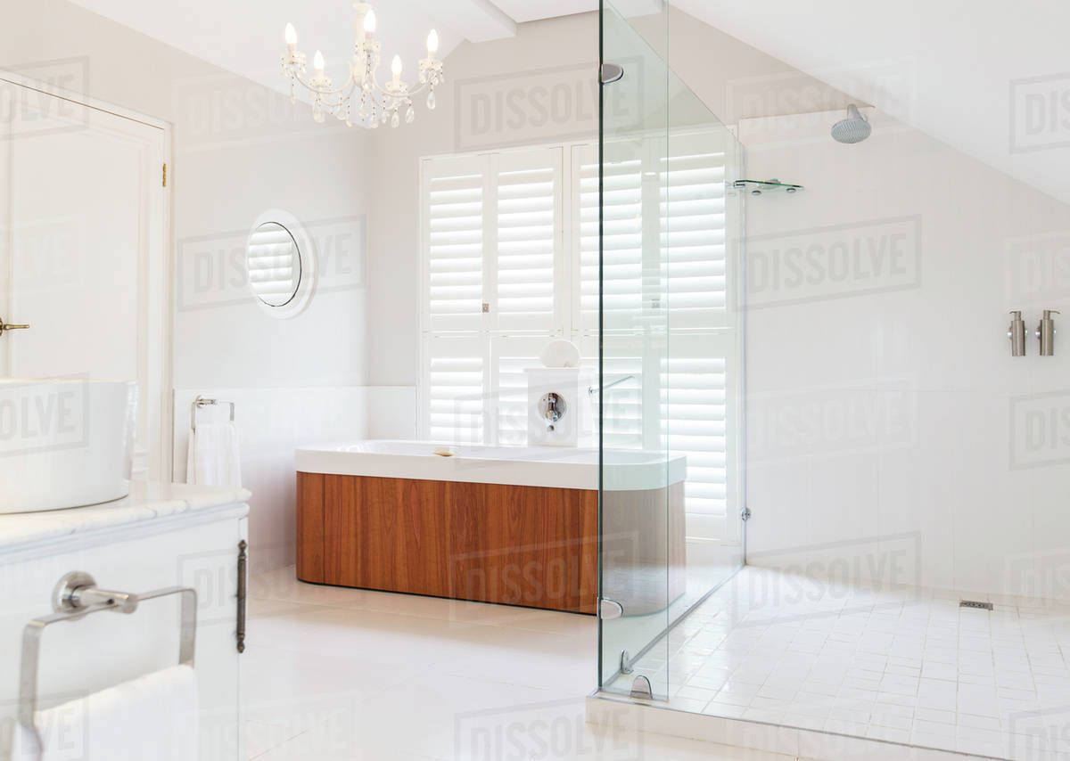 Chandelier over soaking tub in modern bathroom Royalty-free stock photo