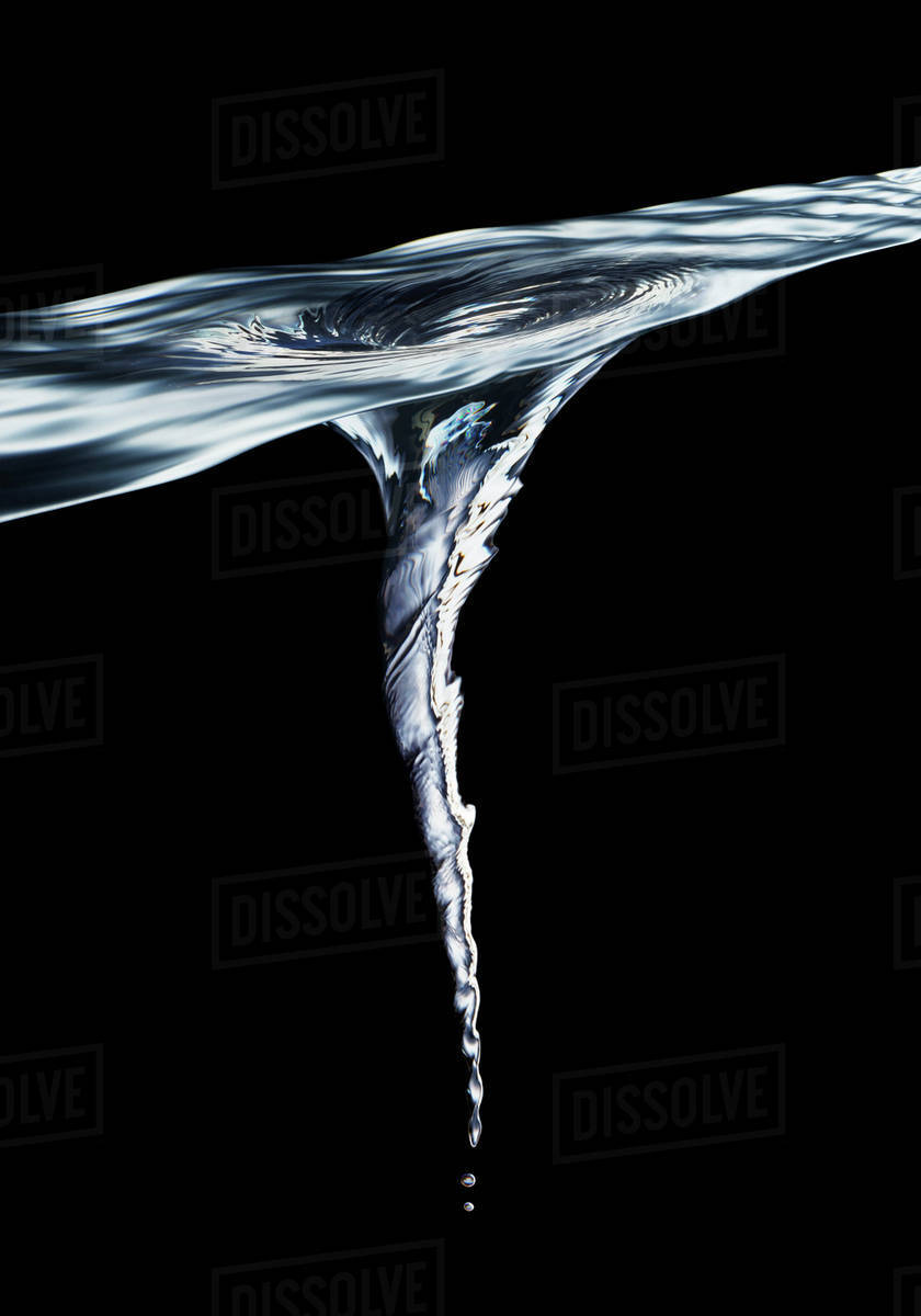 Vortex forming in water - Royalty-free Stock Photo | Dissolve