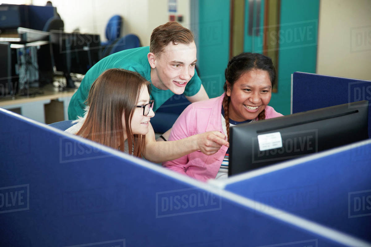 College students using computer in classroom Stock Photo Dissolve