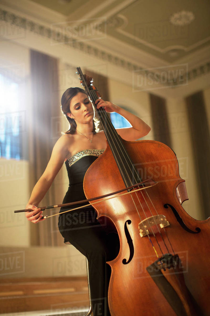 Double bassist performing Stock Photo Dissolve