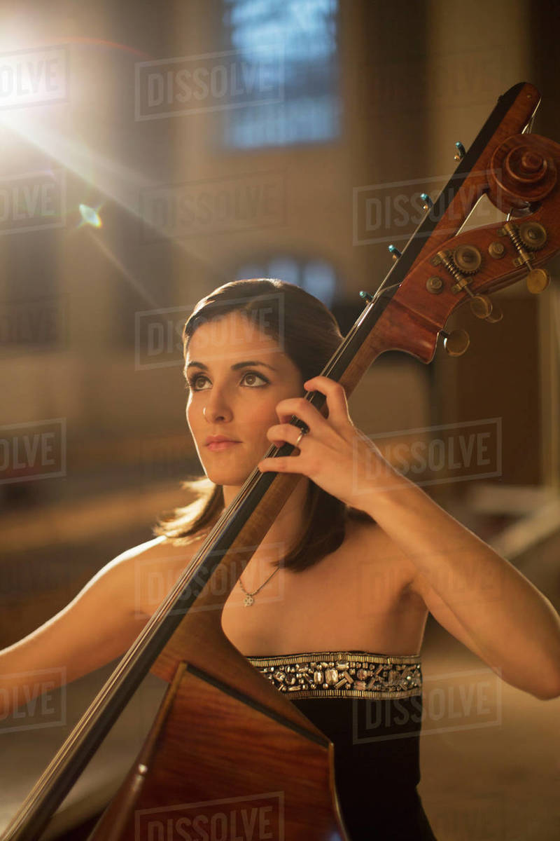 Double bassist performing Stock Photo Dissolve