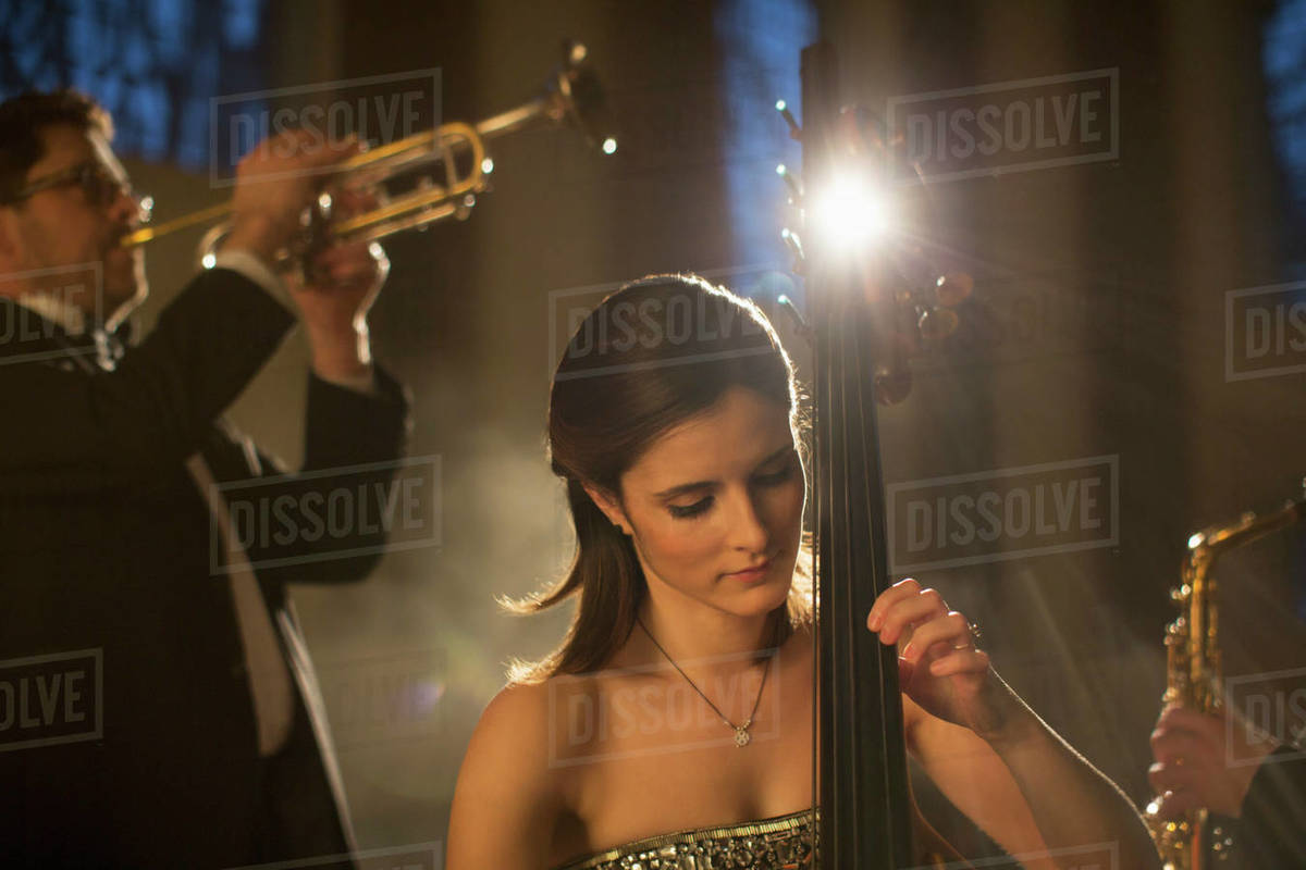 Double bassist performing Stock Photo Dissolve