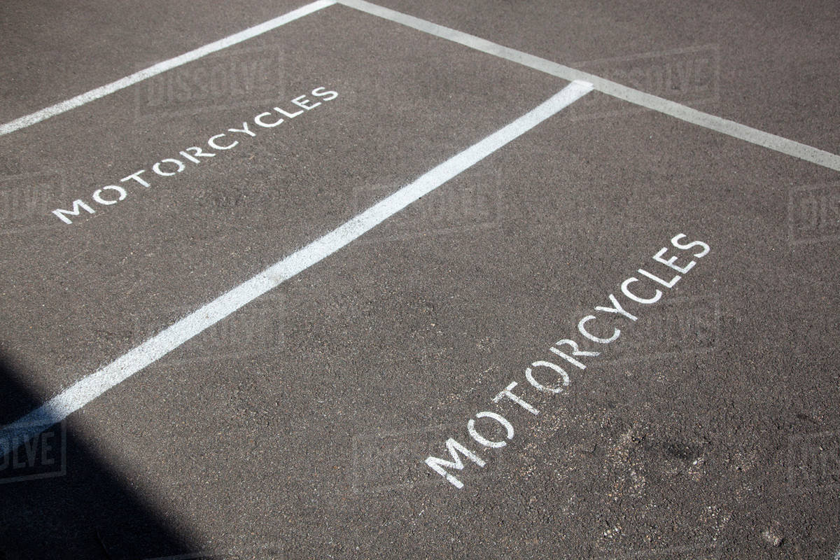 Two motorcycle parking spaces Stock Photo Dissolve