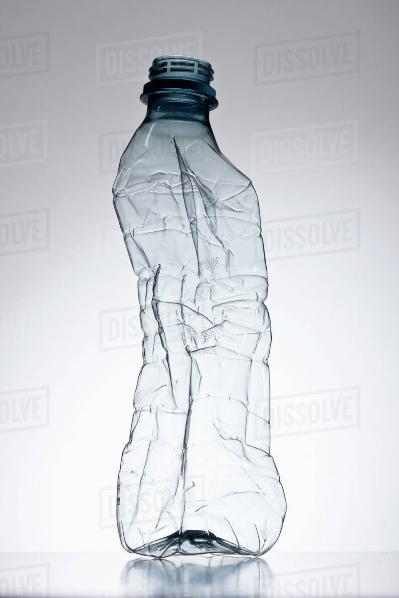 Plastic bottle out of shape Stock Photo Dissolve