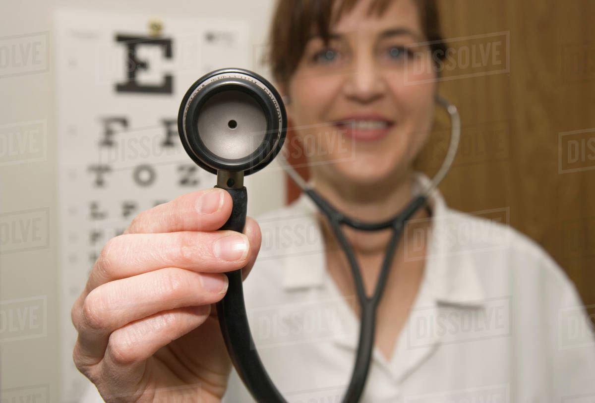A doctor using a stethoscope - Royalty-free Stock Photo | Dissolve