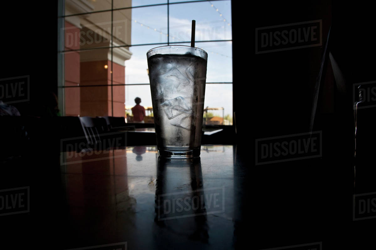 A glass of ice water on a table in a restaurant - Royalty-free Stock ...