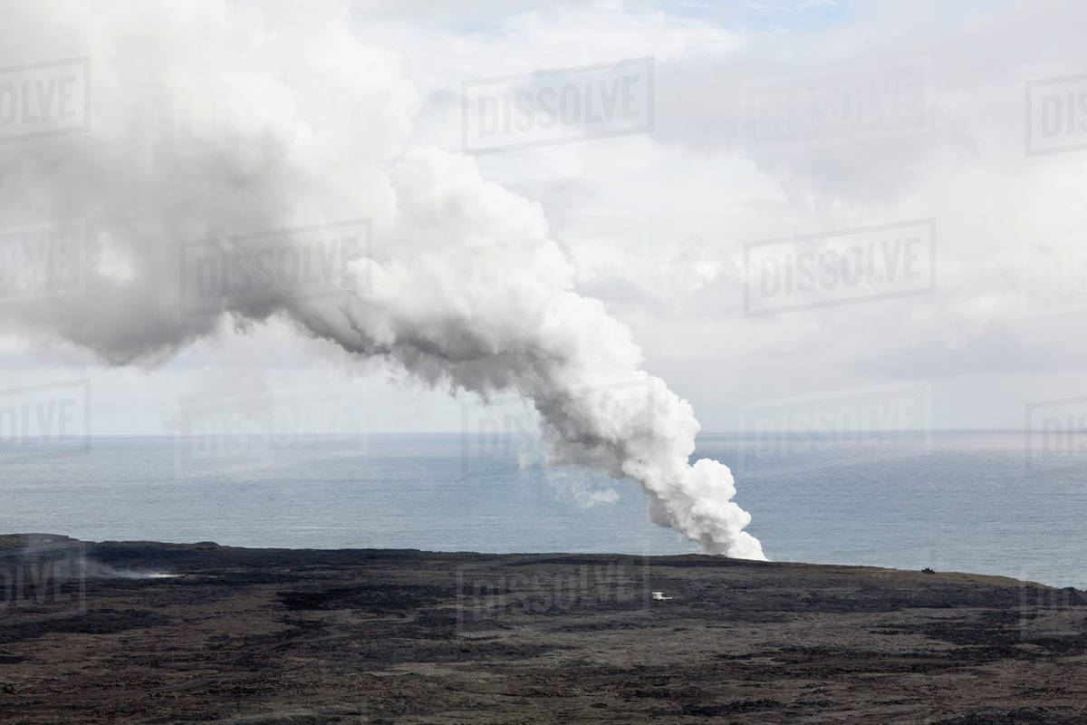 Steam from volcano in Hawaii Stock Photo Dissolve