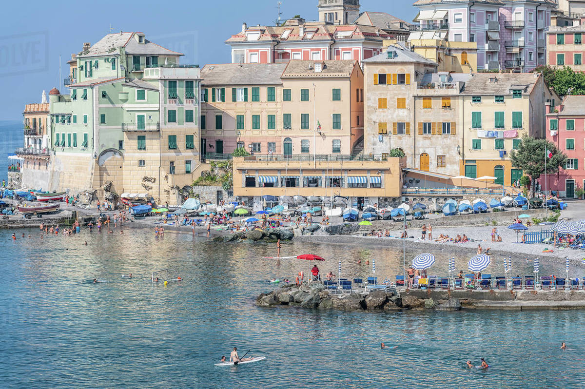 View of colorful waterfront buildings and tourist beach, Bogliasco, Liguria, Italy Royalty-free stock photo