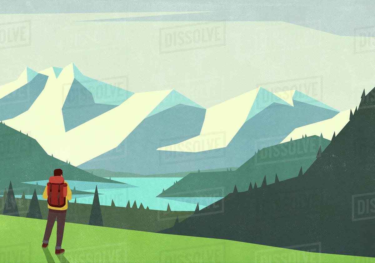Male backpacker looking at tranquil mountain landscape view Royalty-free stock photo