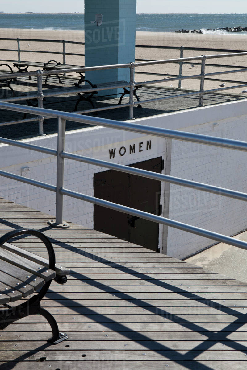 A women's public restroom on the beach at Coney Island, USA Stock
